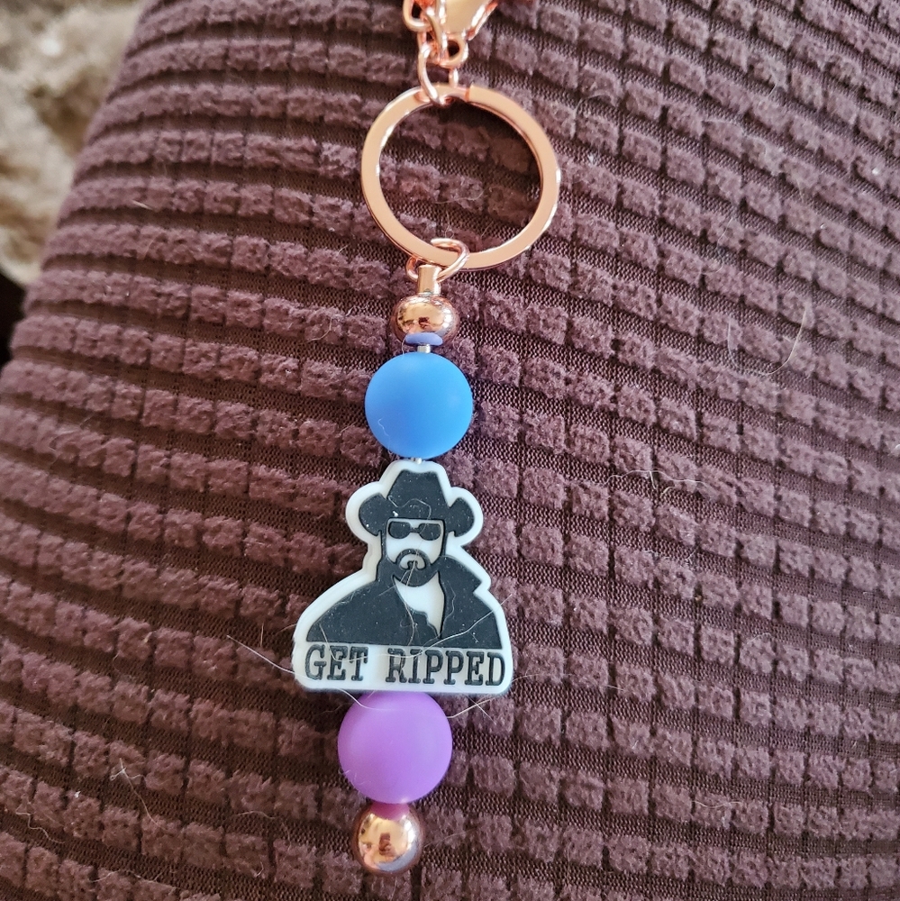 This a keychain with rip from Yellowstone on it .